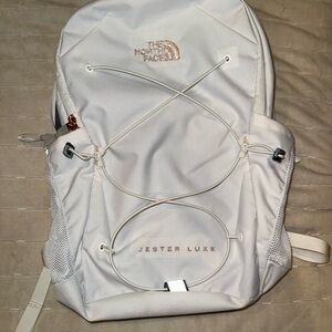 The North Face Jester Backpack- White/Metallic Gold